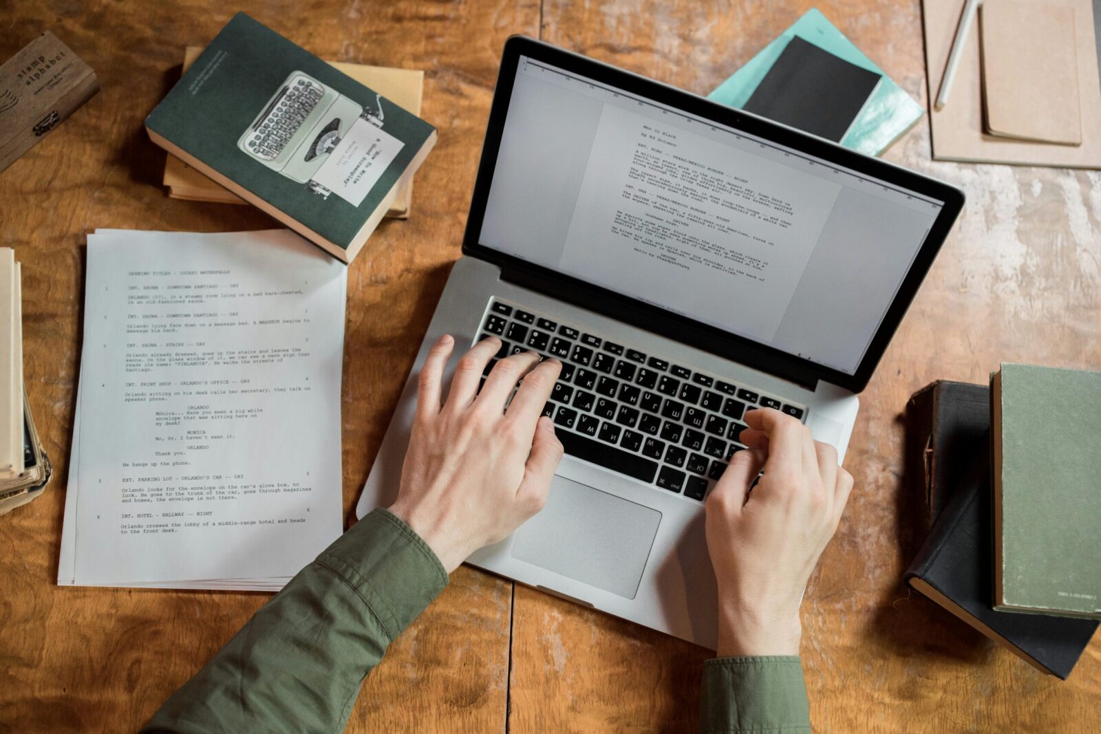 completing copywriting job using laptop