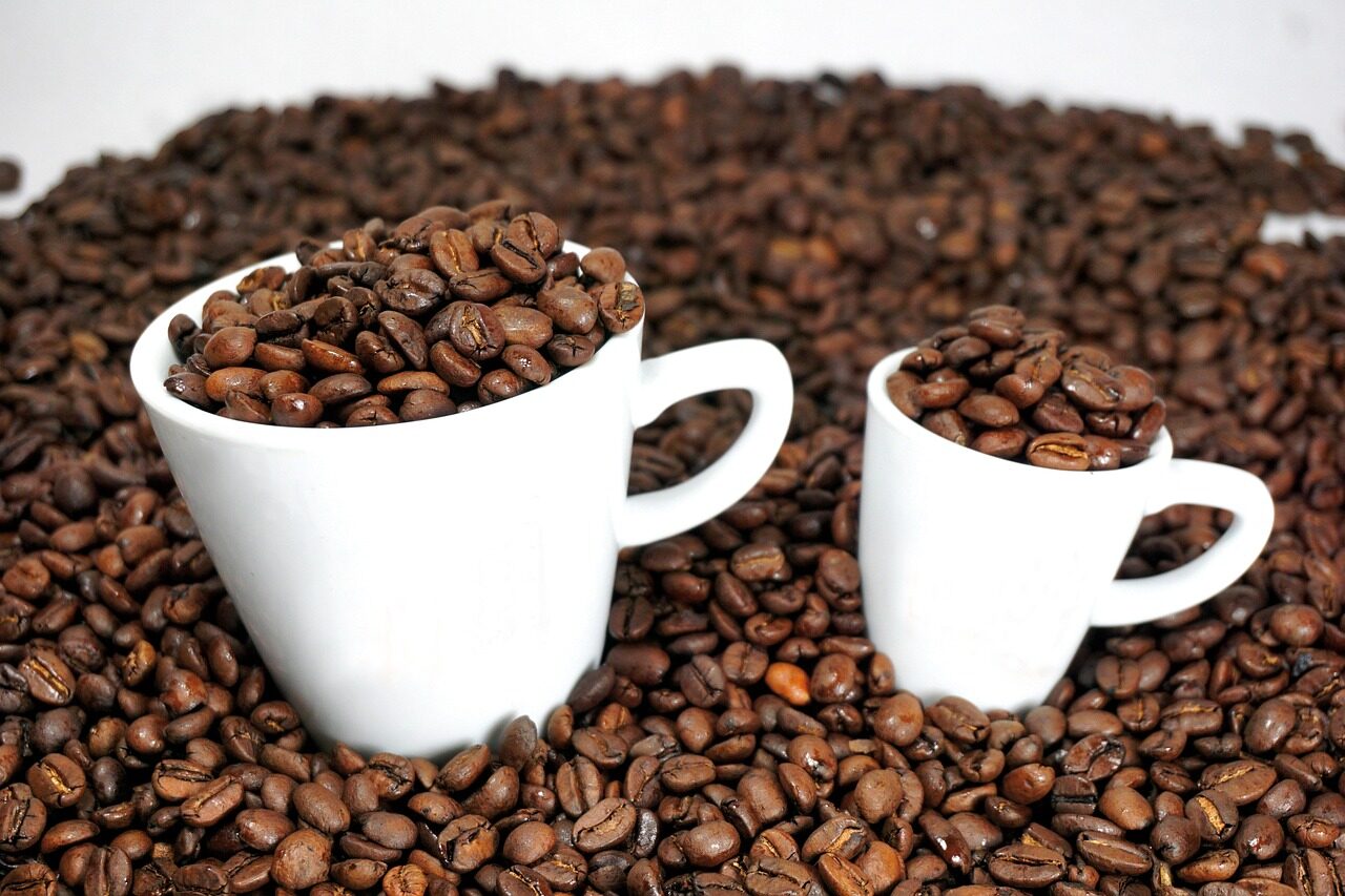 espresso beans in two cups
